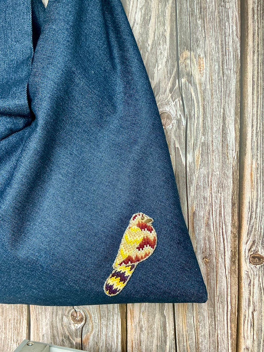 Origami denim bag with bird embroidery