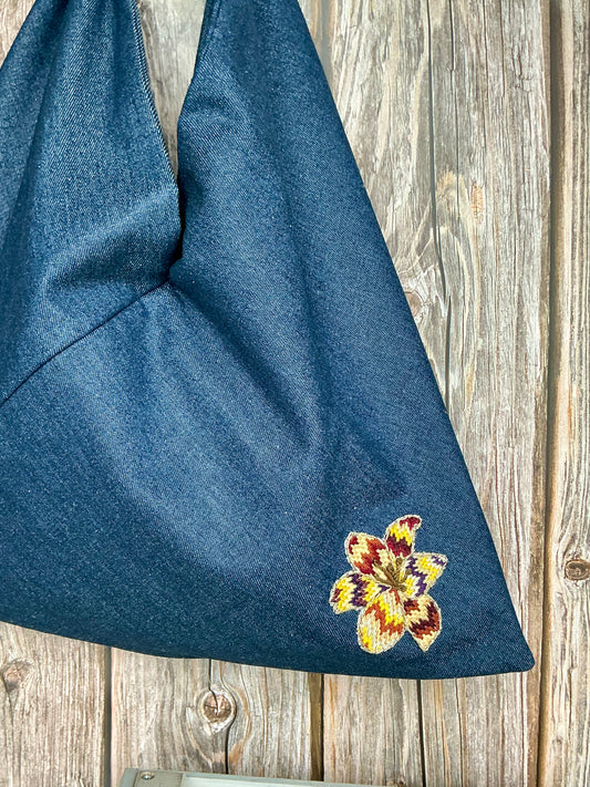 Origami denim bag with lily embroidery